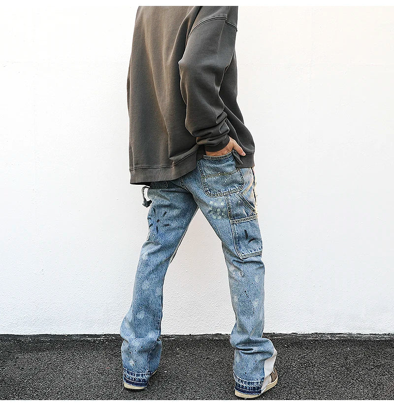 Jeans mit Farbflecken