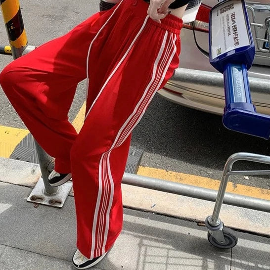 Red track pants