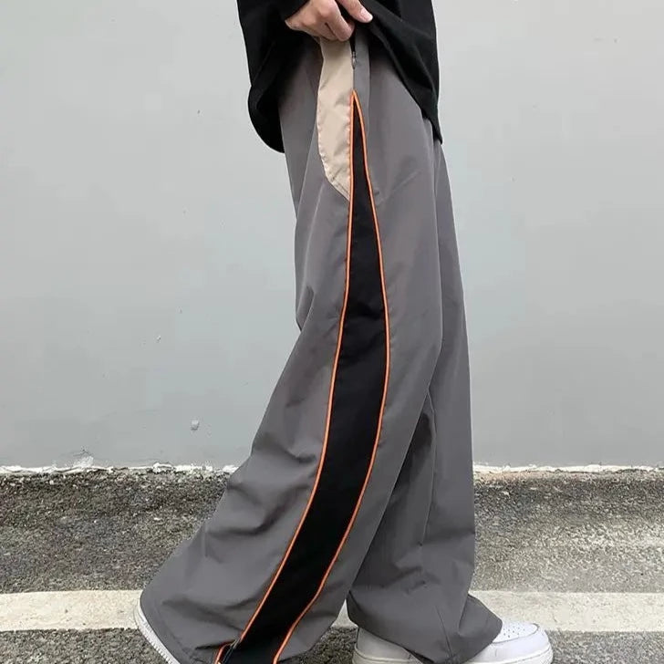 Grey track pants