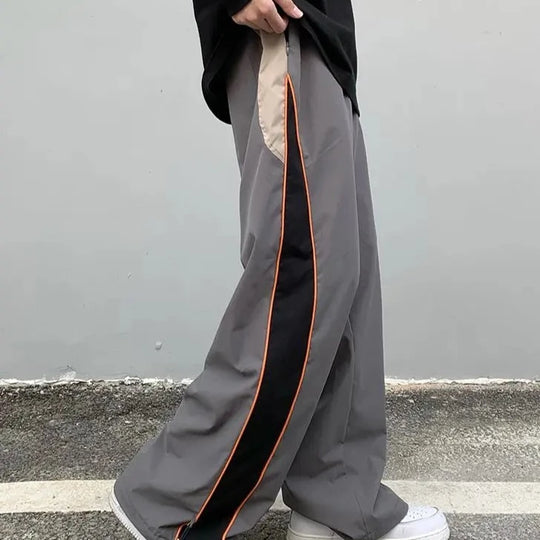 Grey track pants