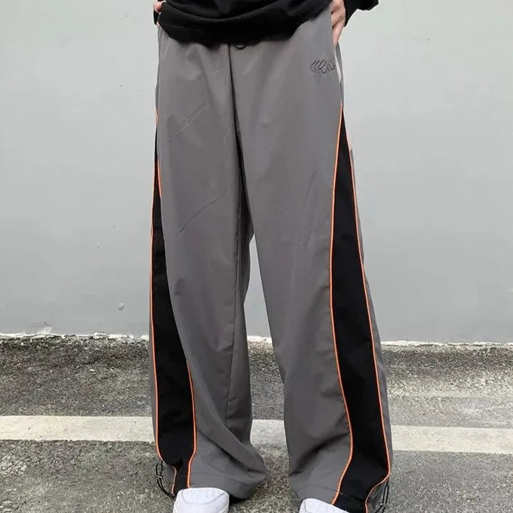 Grey track pants