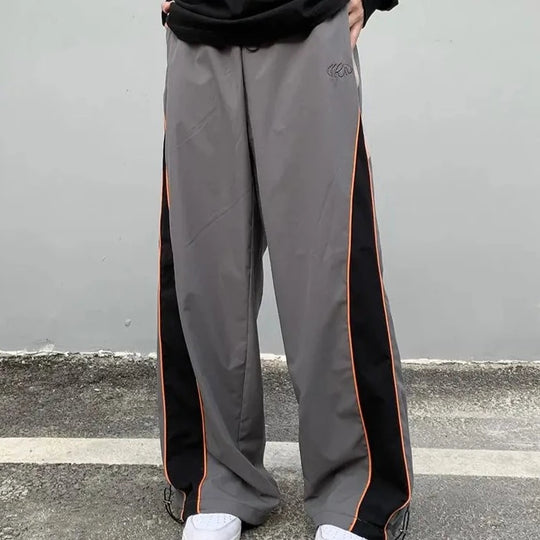 Grey track pants