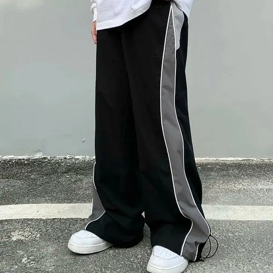 Grey track pants